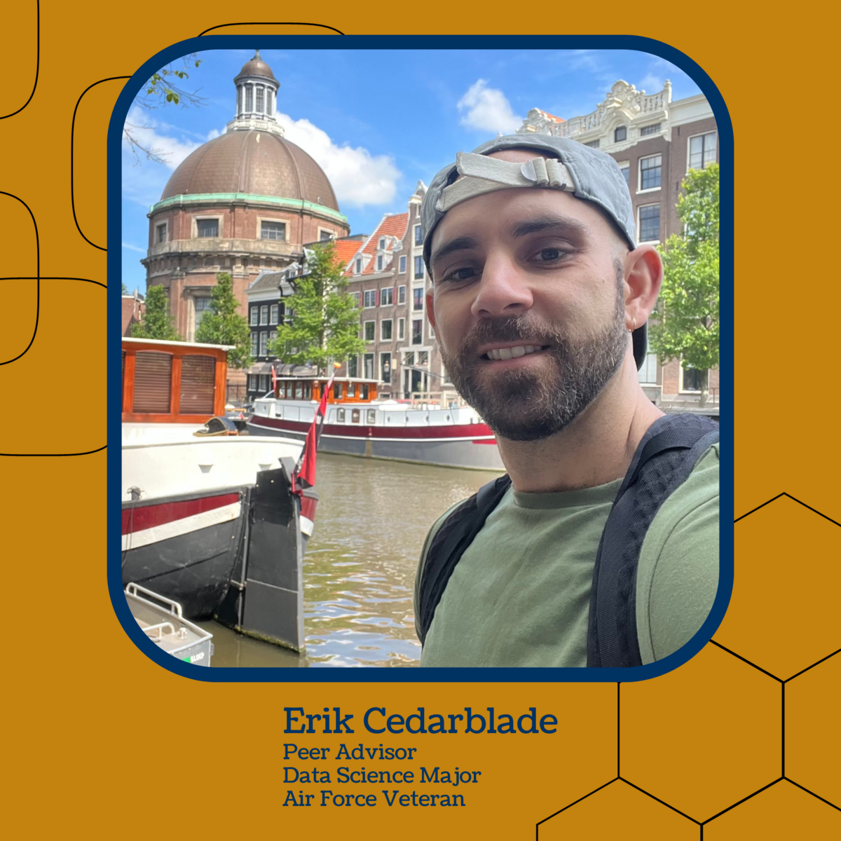 Image of student with two boats on a river and a domed building in the background.