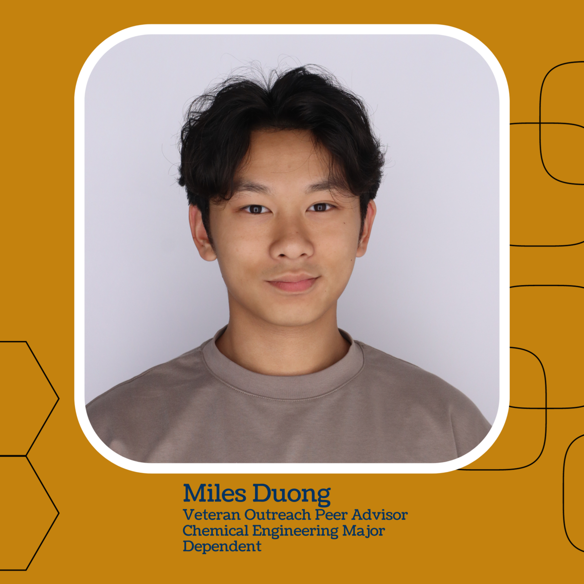 Headshot photo of student wearing cream colored shirt with white solid background.